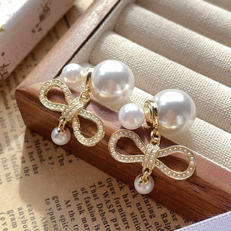 Alternative view of DIOR TRIBALES EARRINGS IN BOW SHAPED WITH PEARLS GOLD
